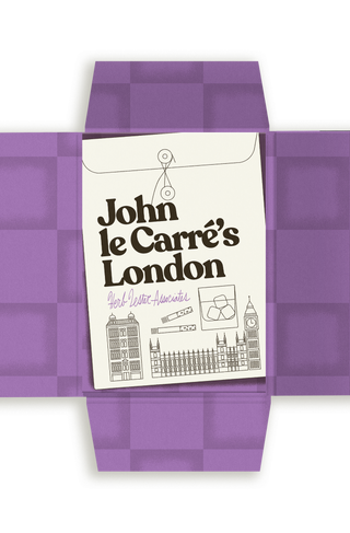 Open folder for John le Carré's London, published by Herb Lester Associates, with a label illustrated with Big Ben, Westminster, and a whisky glass, set within a purple folder.