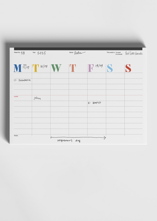 A single filled-in sheet from The Herb Lester Weekly planner, propped upright, showing handwritten entries including a presentation, a dentist appointment, and a note about the neighbour's dog running across the week.