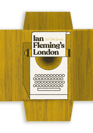 Open mustard yellow wood-effect packaging for Ian Fleming's London, revealing an inner cover illustrated with a vintage typewriter.