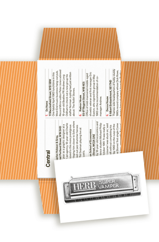 Open orange striped packaging for The Rolling Stones' London 1962-71, showing a text spread on central London entries including De Hems and Decca House, with a harmonica-shaped card reading 'Herb Super Vamper' laid on top.